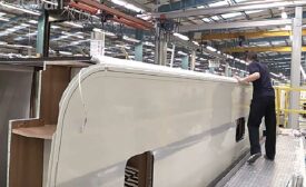 Adhesive assembles composite parts for new motorhome